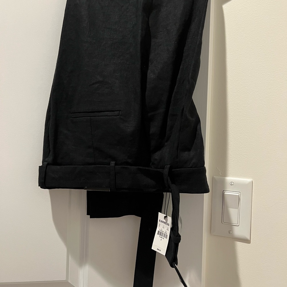 Express 52% linen 45% Rayon 3% Spandex black pants. New with tag.
